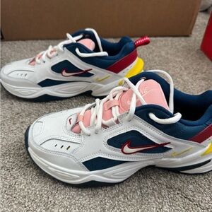 Nike Women’s White and Navy Sneakers with Red Accents